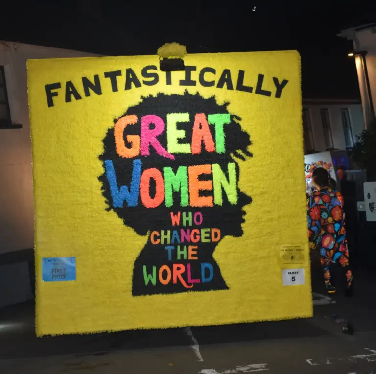The yellow crepe-paper Fantastically Great Women Who Changed The World float board