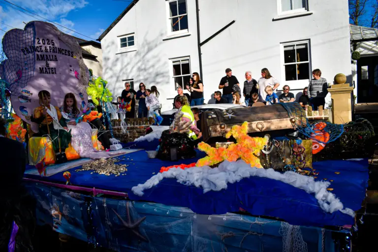 The 2025 Prince and Princess float with treasure chest, starfish and crepe-paper waves