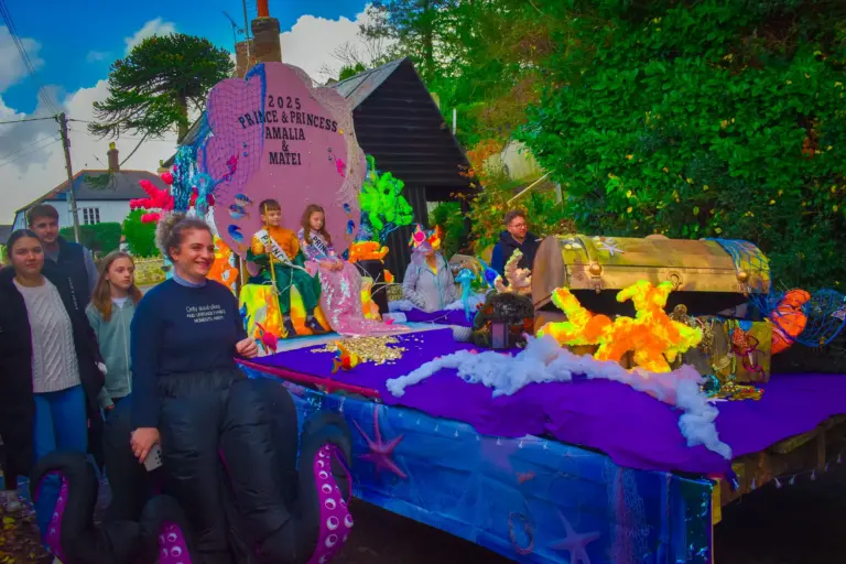 The Prince and Princess under-the-sea float making its way through the afternoon parade