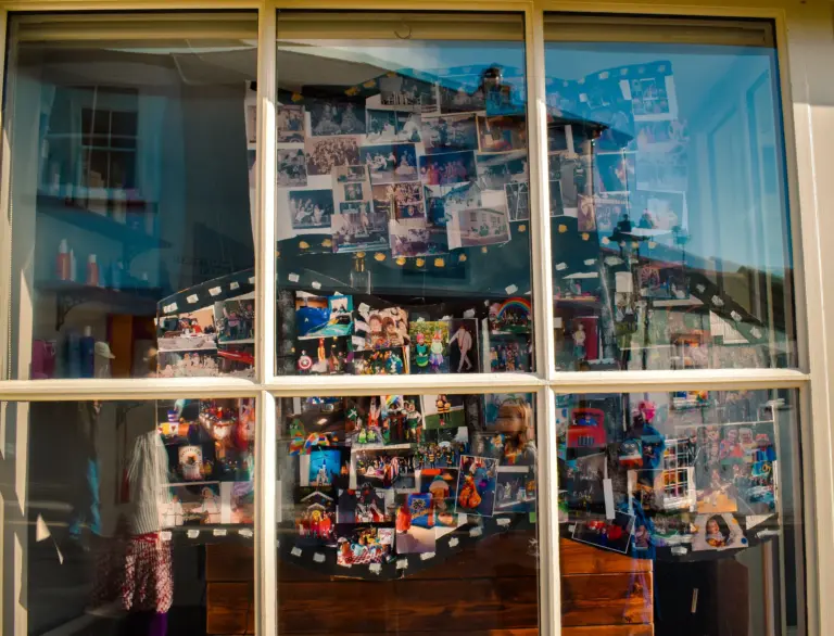 Shop window filled with decades of carnival photographs and memorabilia